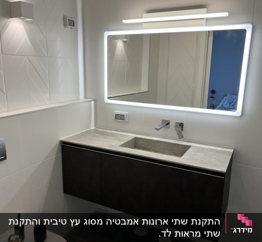 modern bathroom with illuminated mirror and sink